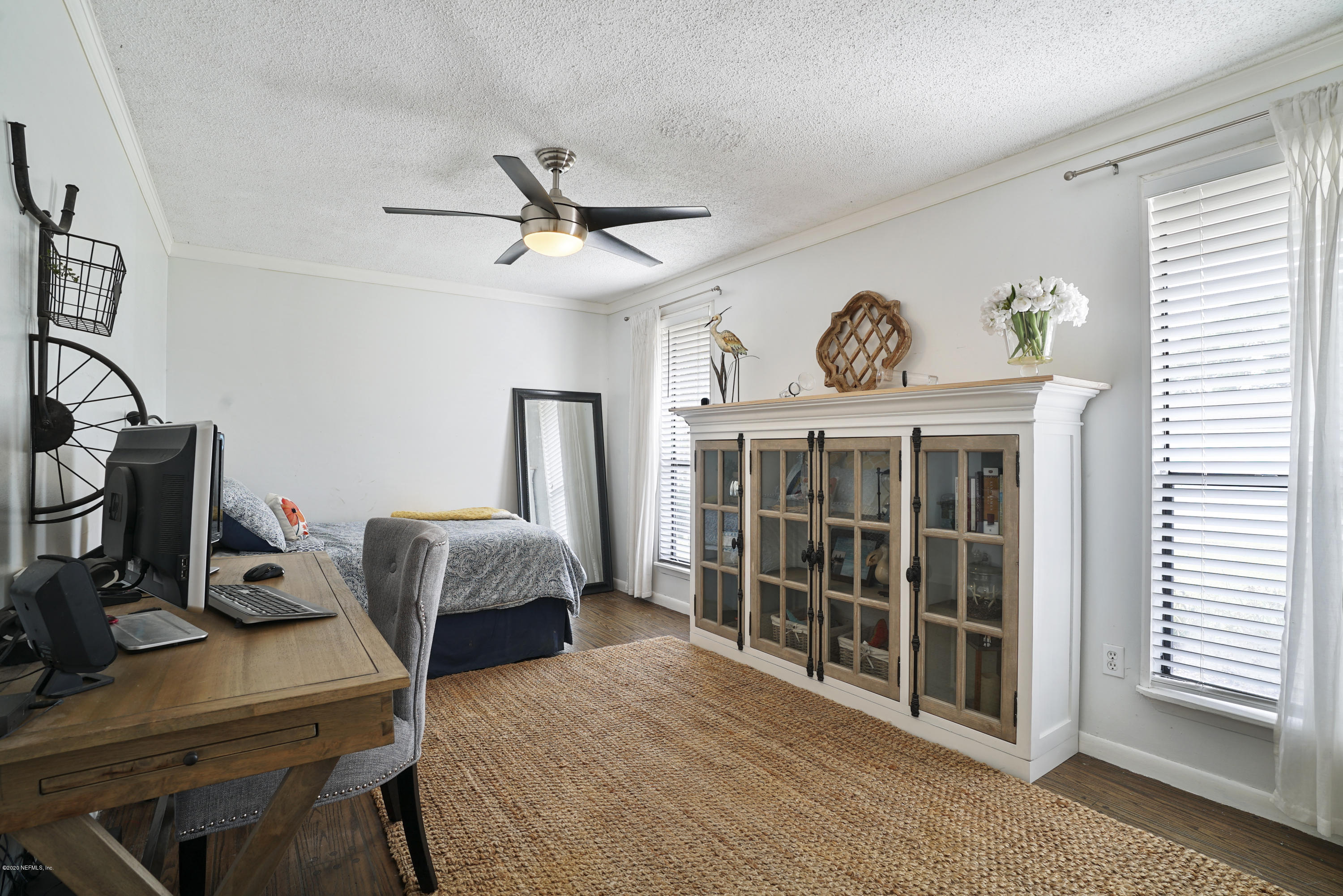 2465 Wattle Tree Road West Jacksonville, FL 32246 - Photo 13 of 31 a bedroom with furniture and a window