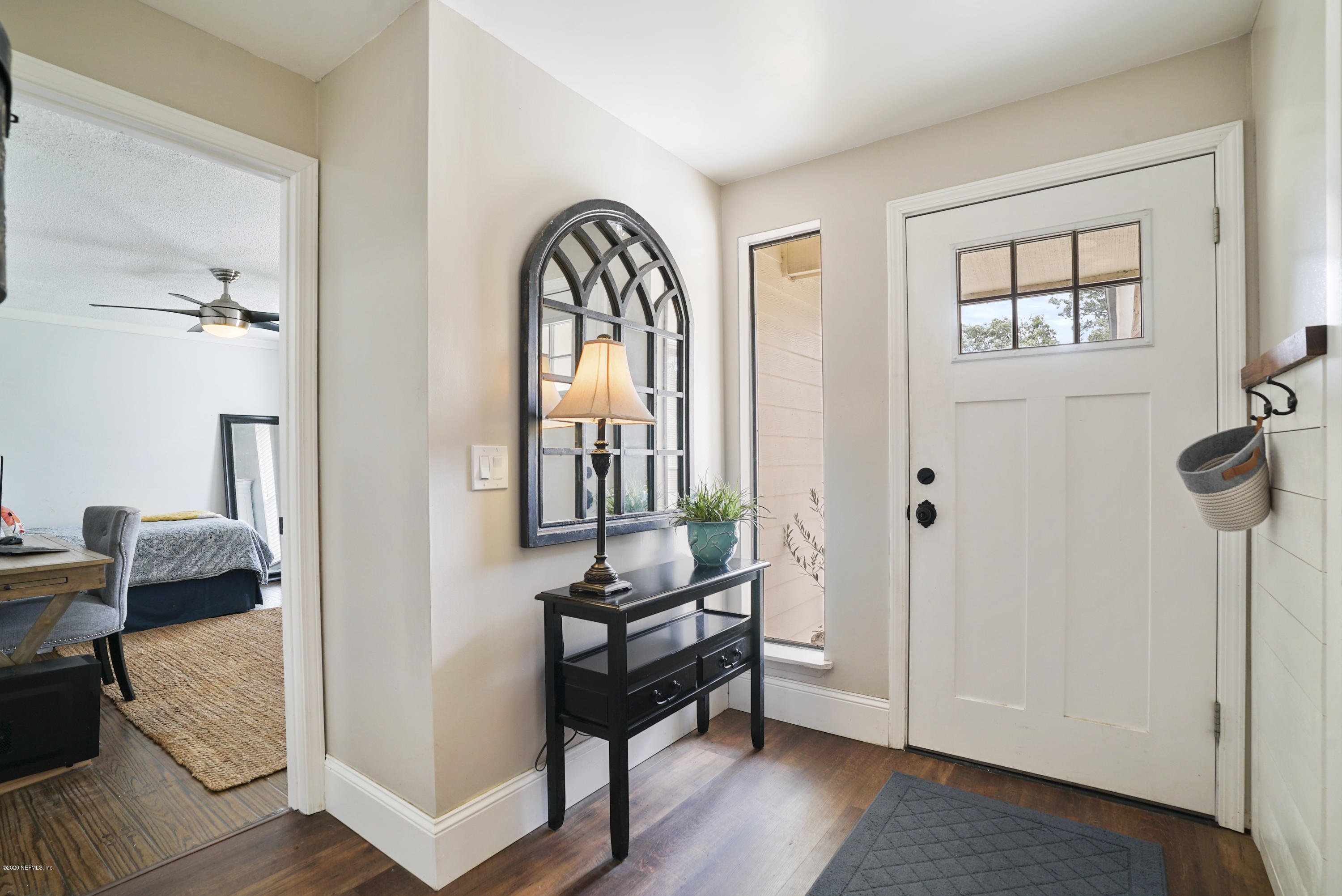 2465 Wattle Tree Road West Jacksonville, FL 32246 - Photo 3 of 31 a view of a livingroom with furniture and windows