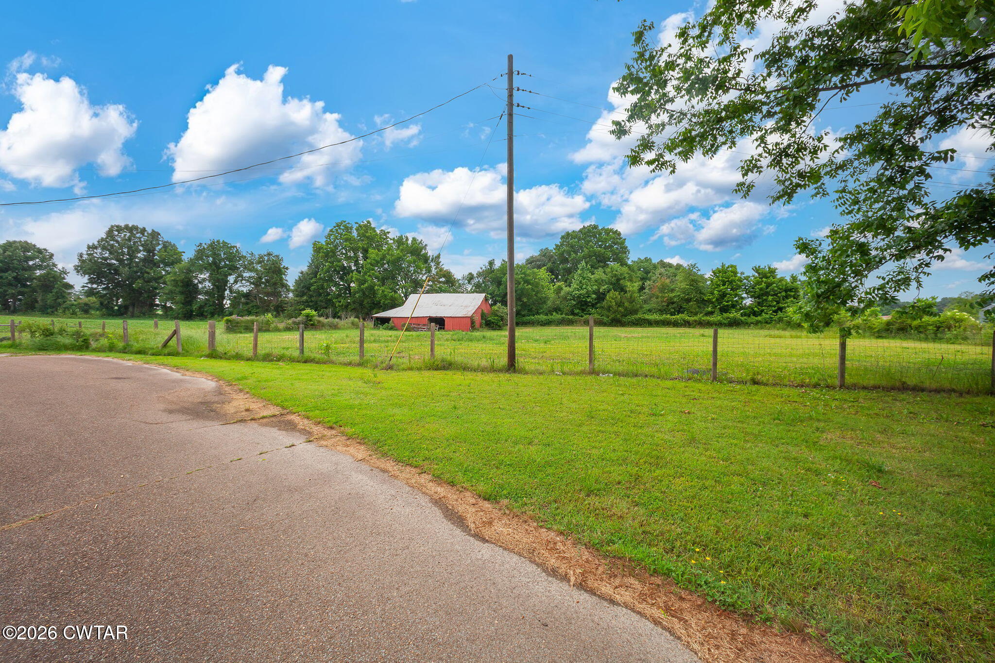 1921 Nance Road Alamo, TN 38001 - Photo 11 of 29 a view of a golf course with a lake view