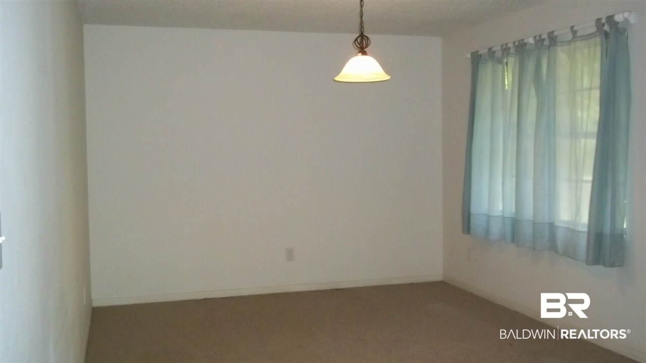 9530 Soldier Creek Road Lillian, AL 36549 - Photo 8 of 11 Master bedroom