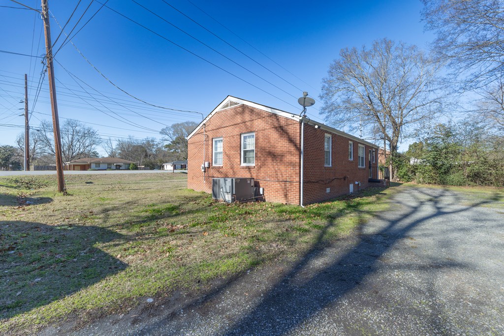 2254 South Lumpkin Road Columbus, GA 31903 - Photo 15 of 16 a view of a house with a yard