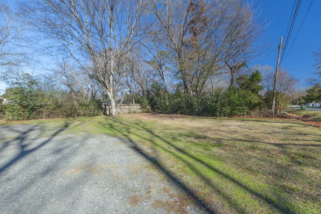 2254 South Lumpkin Road Columbus, GA 31903 - Photo 16 of 16 a view of dirt field with trees