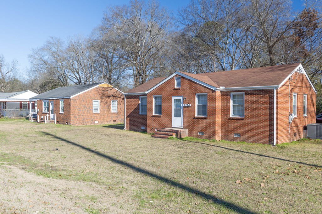 2254 South Lumpkin Road Columbus, GA 31903 - Photo 3 of 16 a front view of a house with a yard
