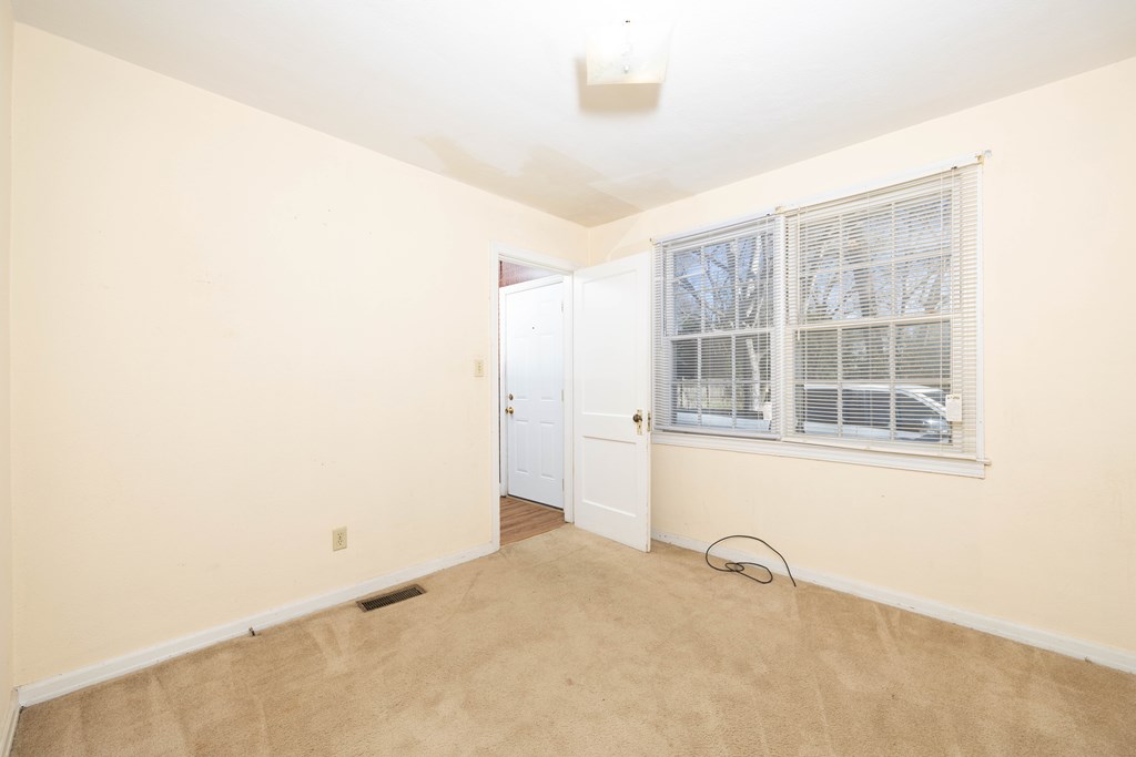 2254 South Lumpkin Road Columbus, GA 31903 - Photo 4 of 16 an empty room with windows