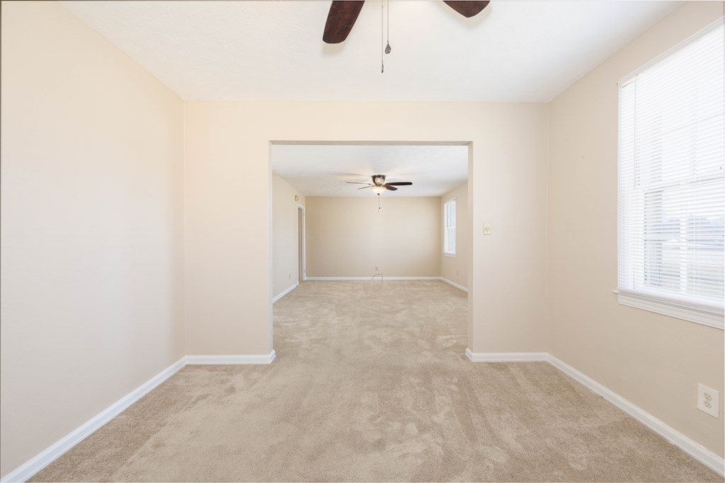 2254 South Lumpkin Road Columbus, GA 31903 - Photo 6 of 16 an empty room with windows and cabinet