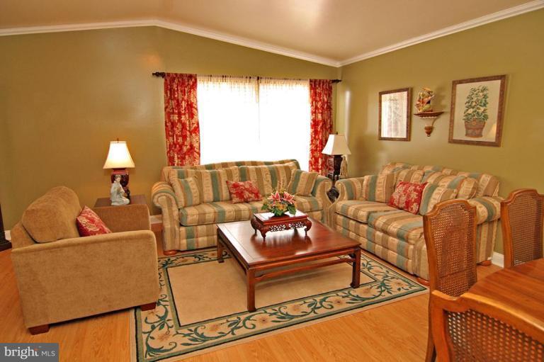 3915 Setonhurst Road Pikesville, MD 21208 - Photo 4 of 17 a living room with furniture and a window