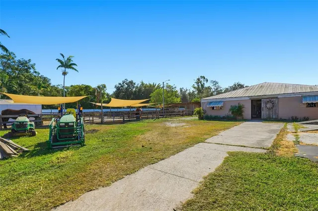 an outdoor living and dining space furniture kitchen view