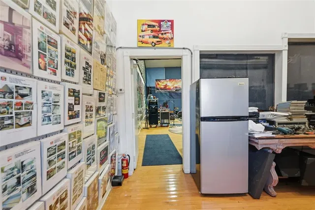 a view of a livingroom with furniture and a chandelier