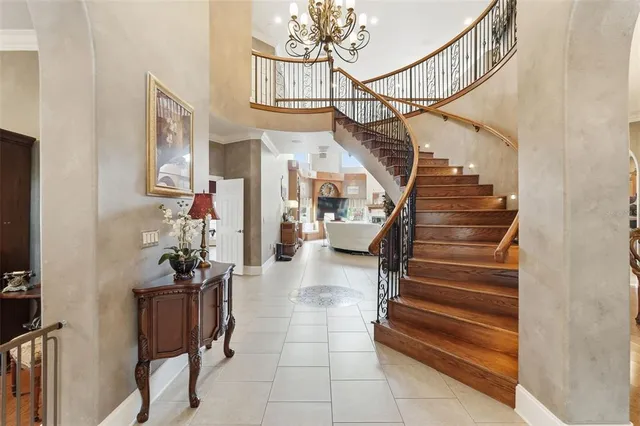 a view of a swimming pool with lounge chairs