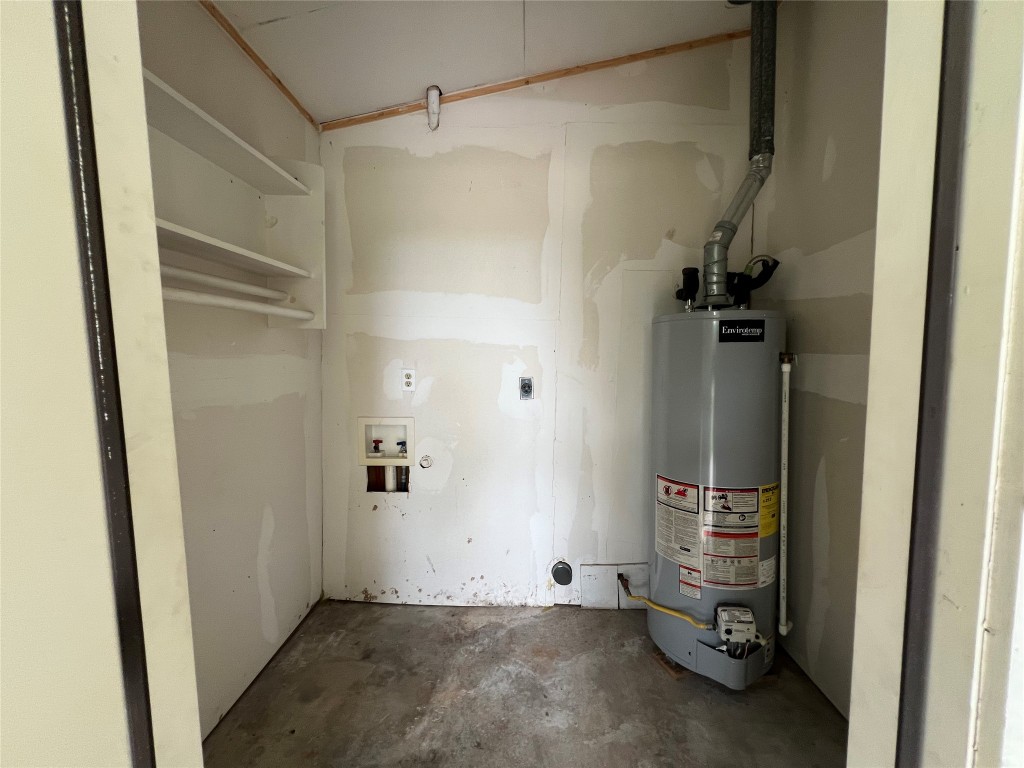 806 West 8th Street Taylor, TX 76574 - Photo 11 of 11 Laundry located in the storage area off the carport.