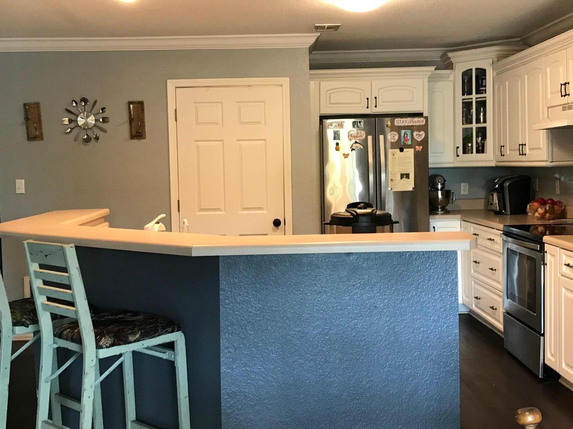 918 Deshazo Road Crestview, FL 32539 - Photo 13 of 28 a kitchen with a sink cabinets and window