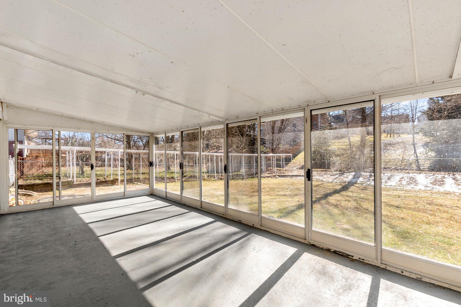 4423 Roundhill Road Alexandria, VA 22310 - Photo 35 of 41 Sun porch off basement w/sliding doors all around