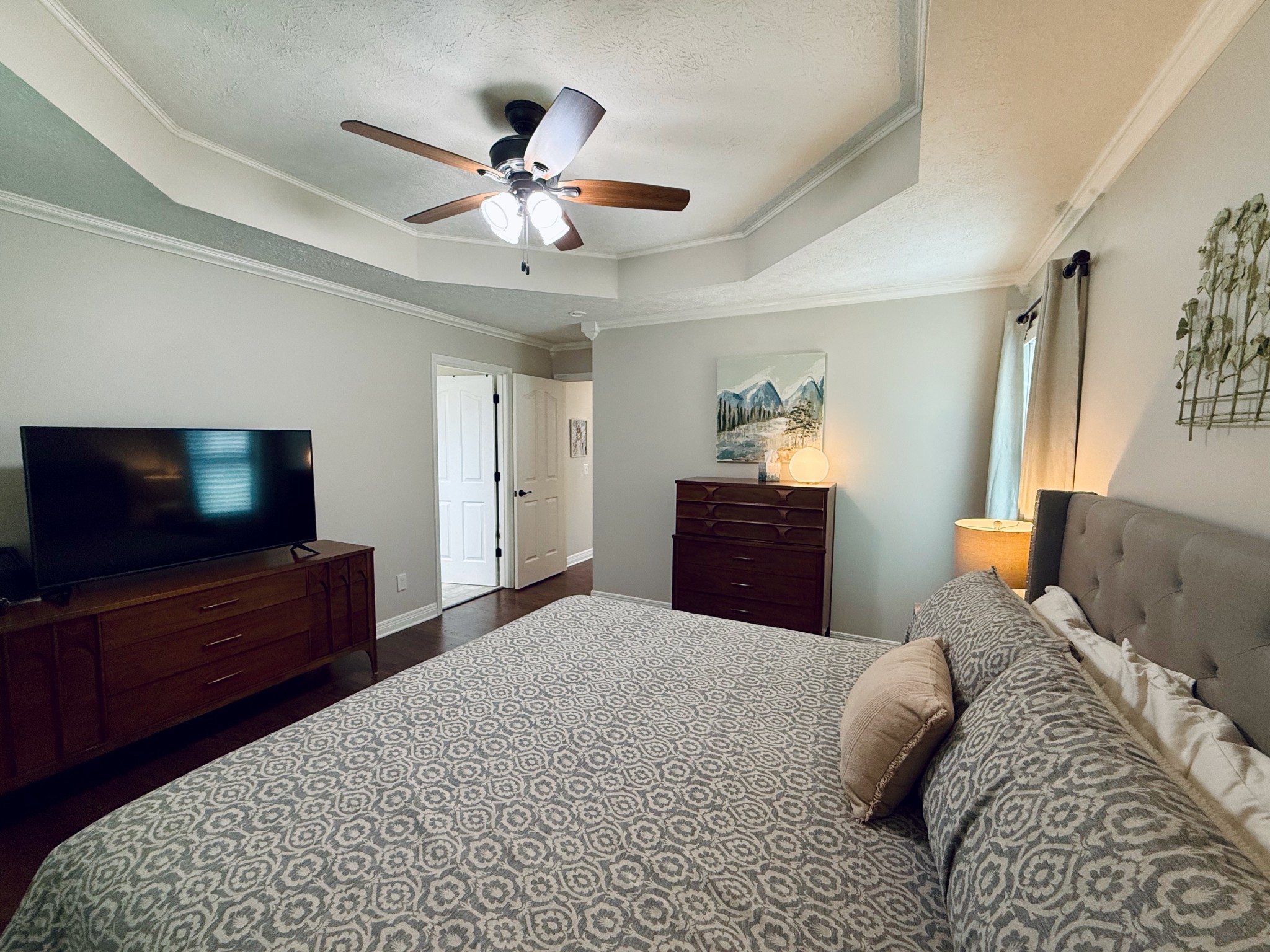 320 Spring Valley Drive Cottontown, TN 37048 - Photo 12 of 48 a bedroom with a bed and a flat screen tv