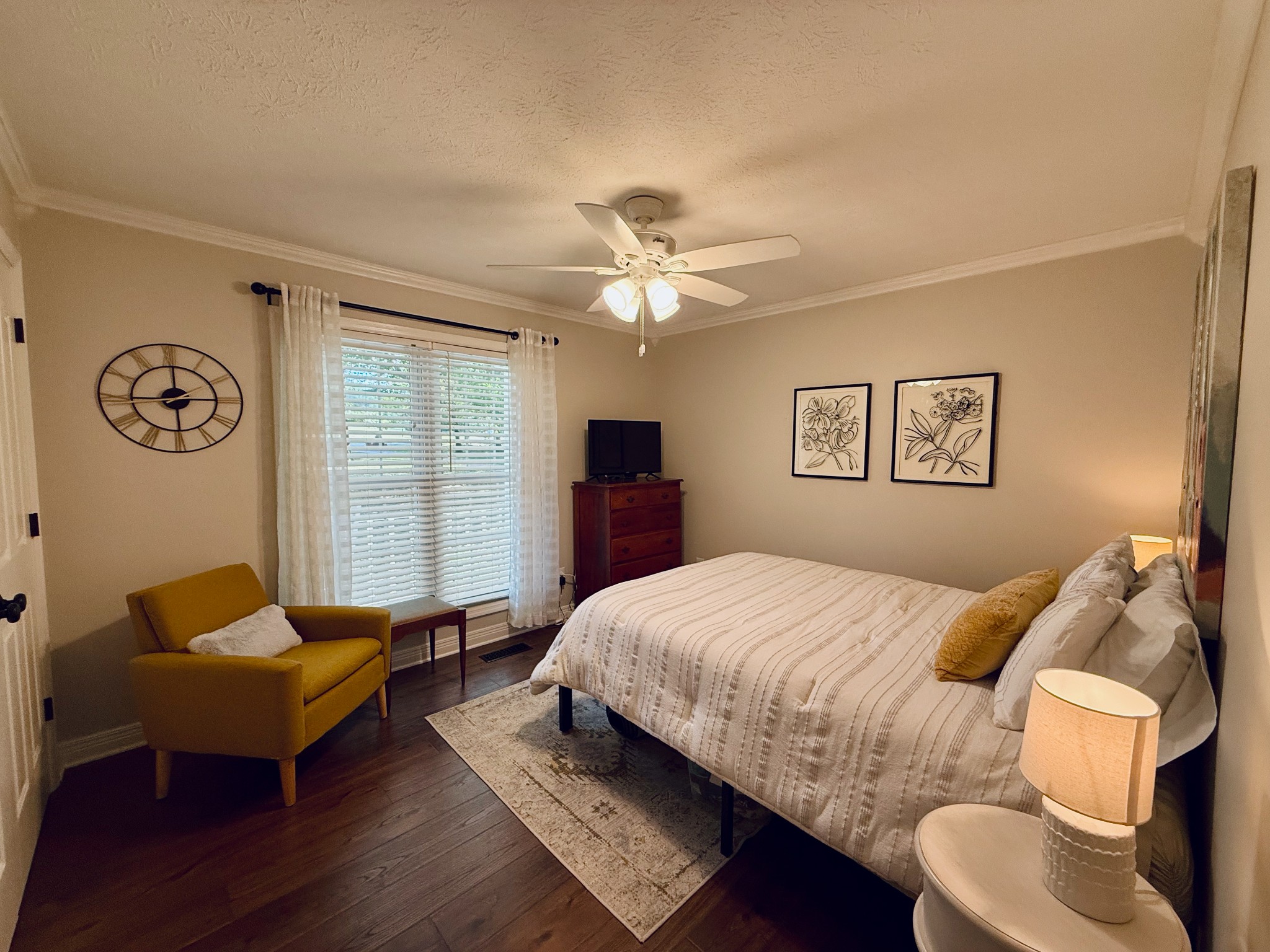 320 Spring Valley Drive Cottontown, TN 37048 - Photo 16 of 48 a bedroom with a bed and wooden floor