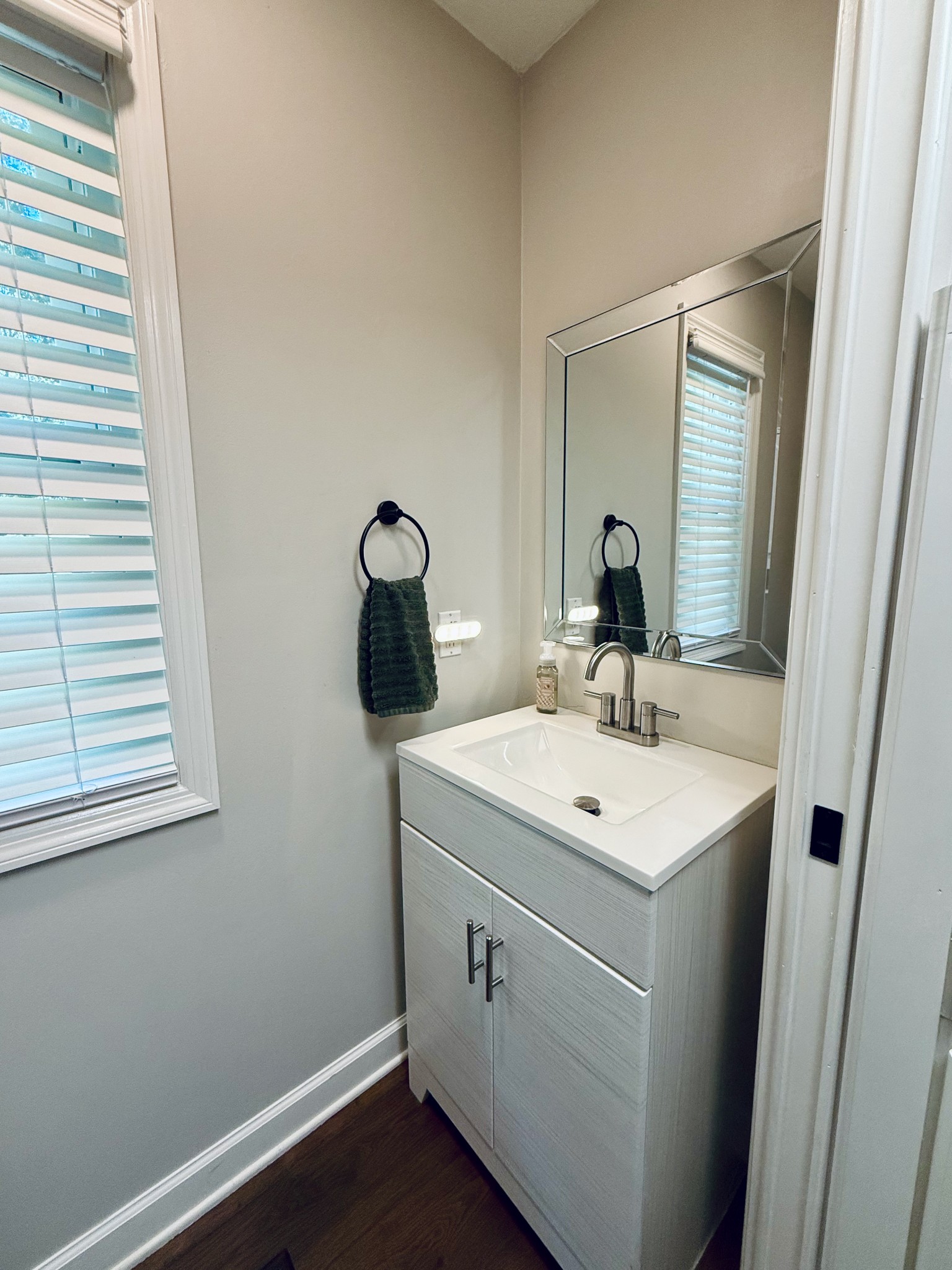 320 Spring Valley Drive Cottontown, TN 37048 - Photo 21 of 48 a bathroom with a sink and mirror