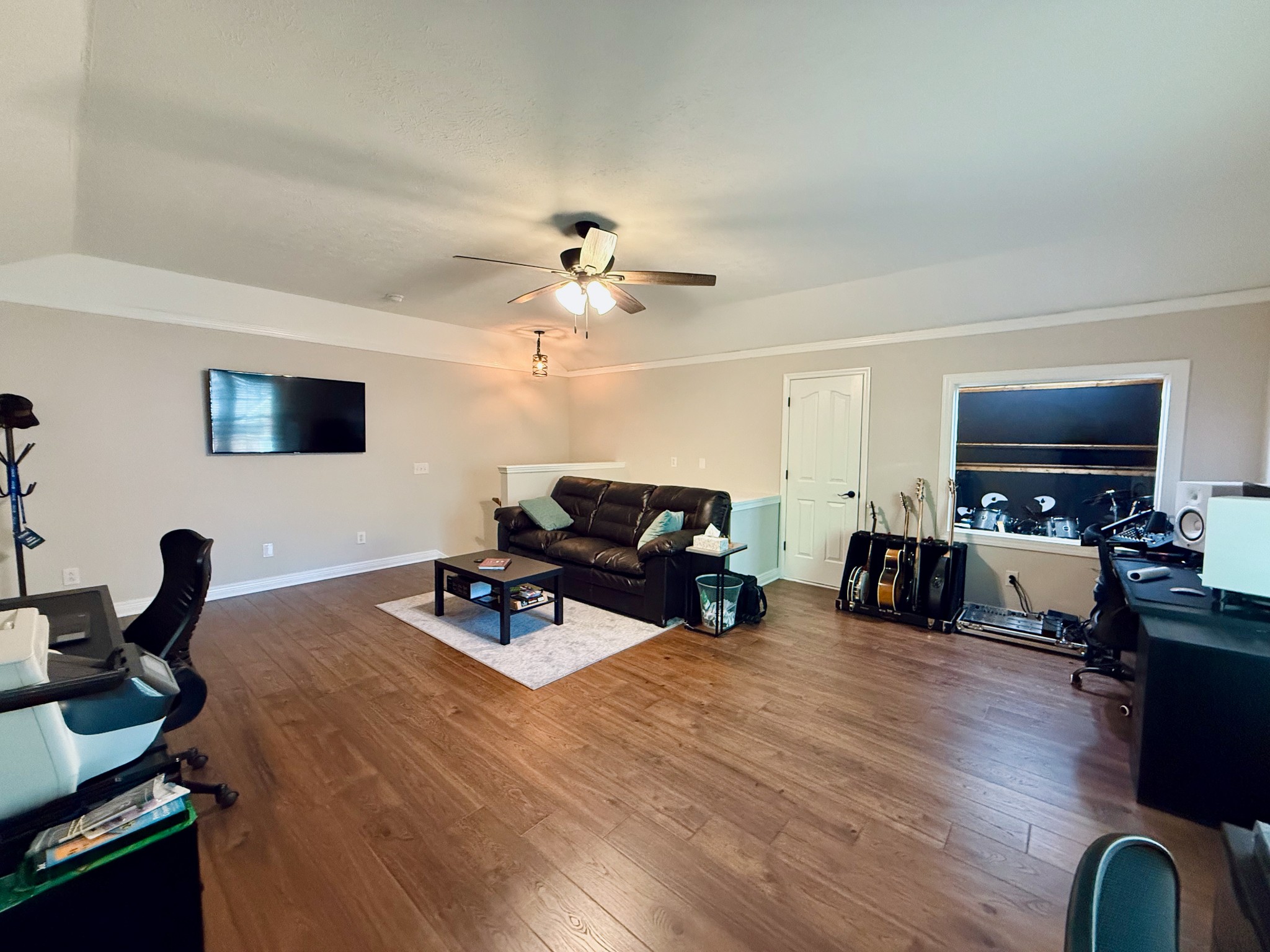 320 Spring Valley Drive Cottontown, TN 37048 - Photo 24 of 48 a living room with furniture flat screen tv and view of kitchen