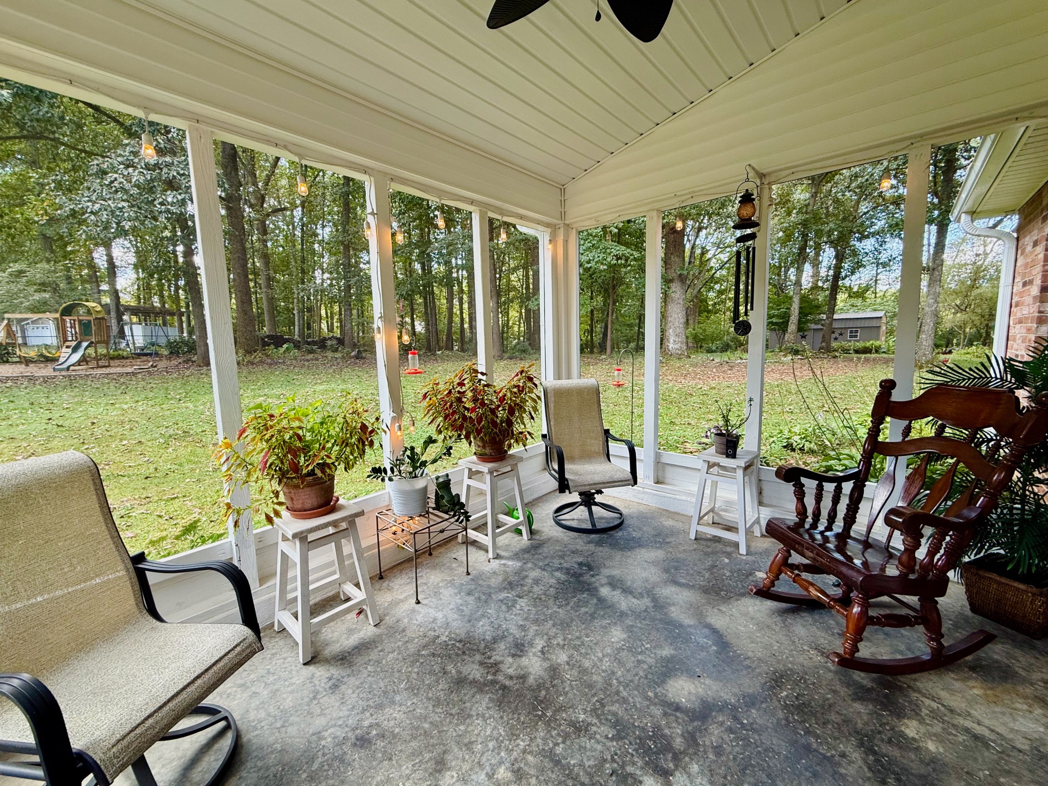 320 Spring Valley Drive Cottontown, TN 37048 - Photo 30 of 48 a view of a patio with chairs and plants