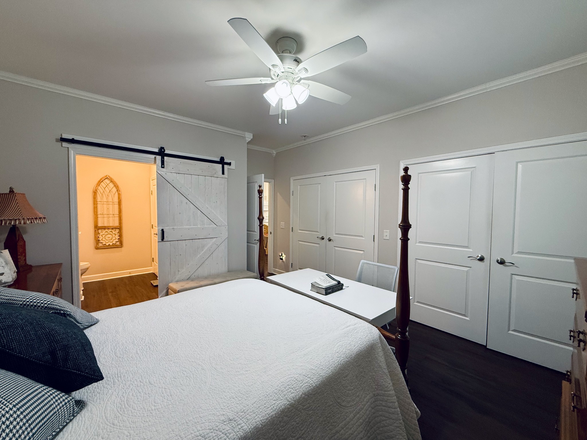 320 Spring Valley Drive Cottontown, TN 37048 - Photo 36 of 48 a bedroom with a large bed and a chandelier