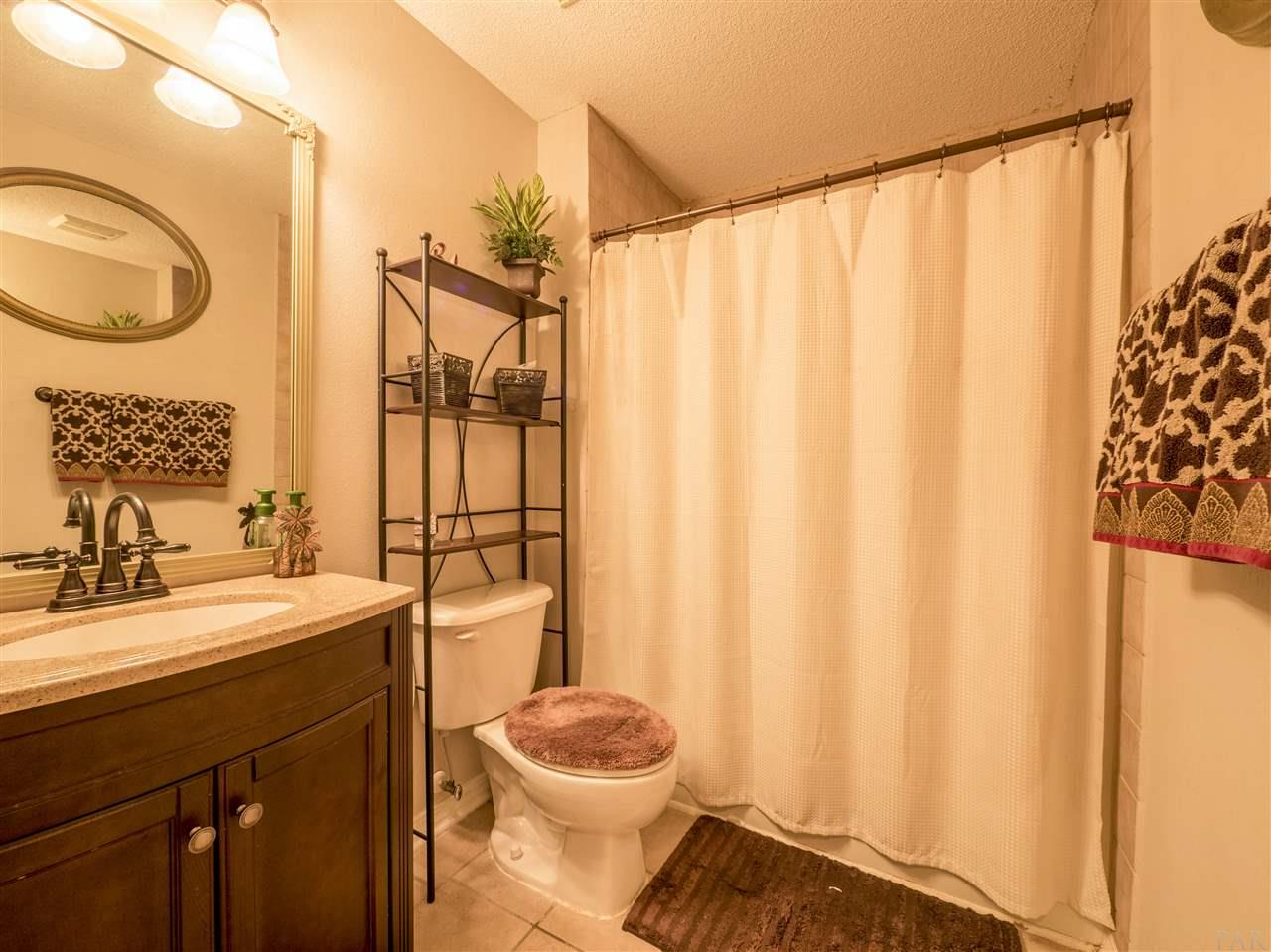 3977 High Bridge Drive Pace, FL 32571 - Photo 22 of 35 Nice bath with new tile and fixtures.