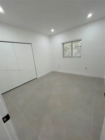 an empty room with a workbench