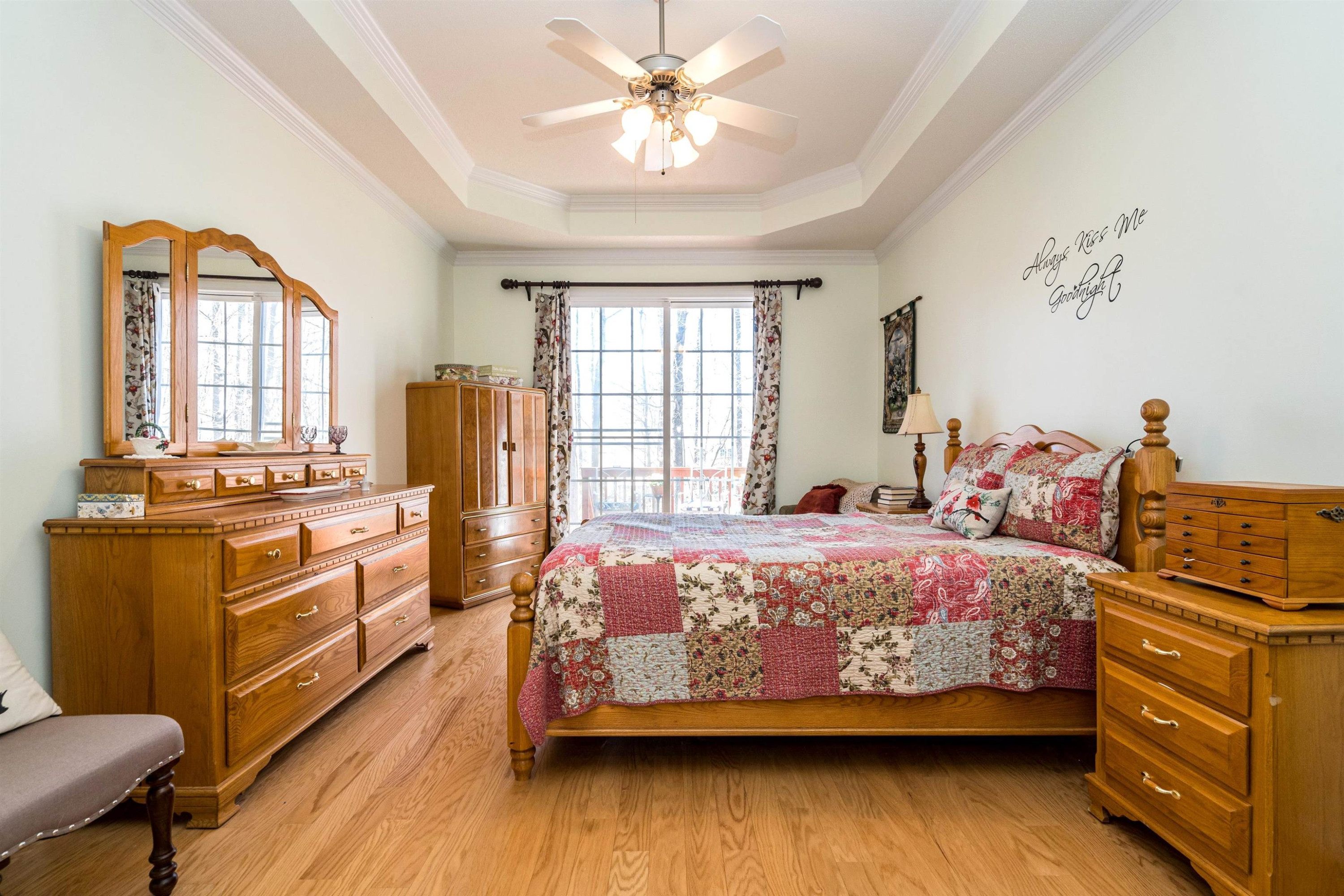 180 Mickleson Ridge Drive Raleigh, NC 27603 - Photo 14 of 32 Lighted Ceiling Fan and Hardwood Floors in Owner's Bedroom