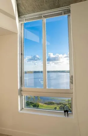 a view of a lake from a balcony