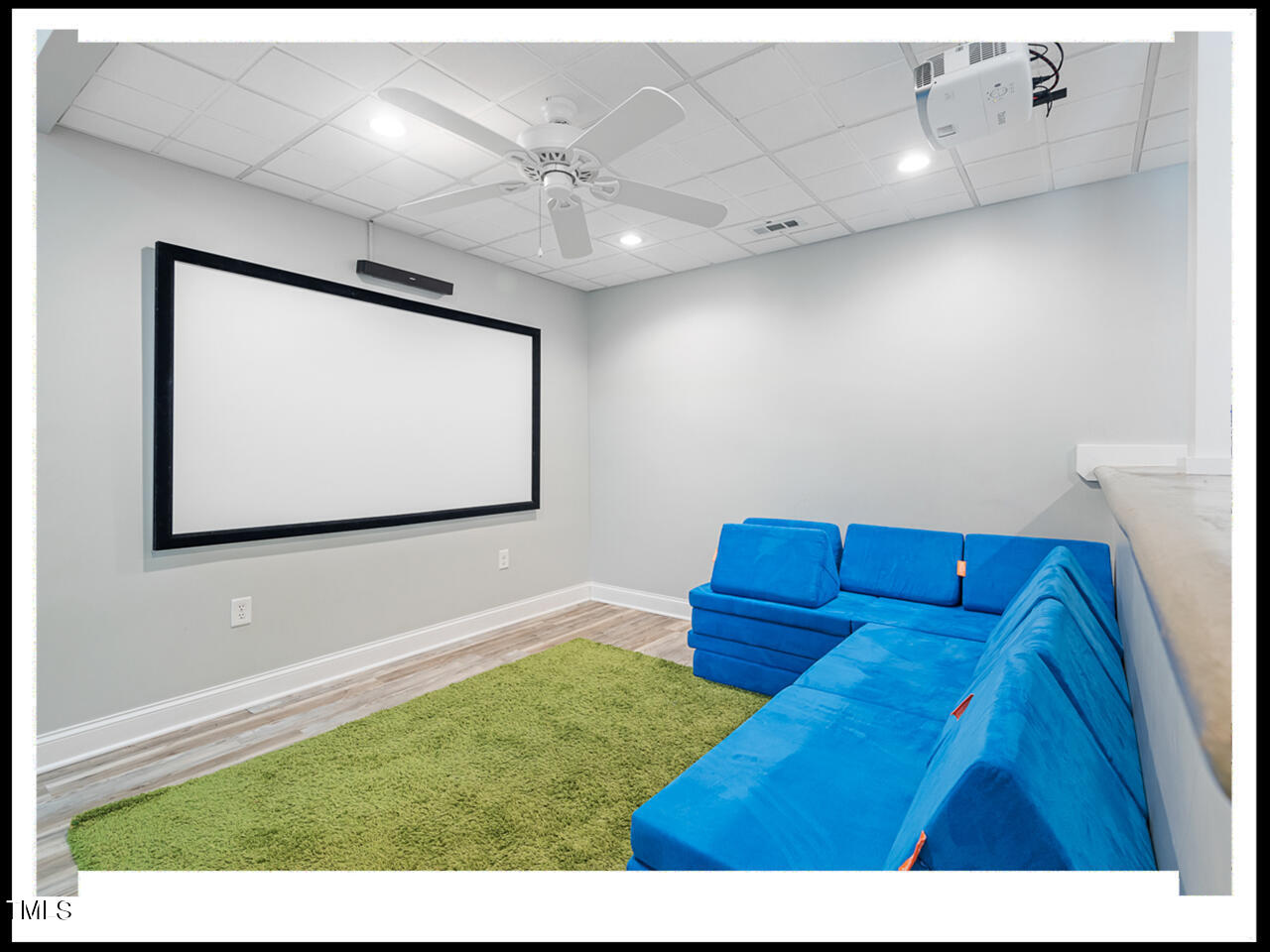 490 Flanagan Road Henderson, NC 27537 - Photo 32 of 92 Projector and screen convey with the home.