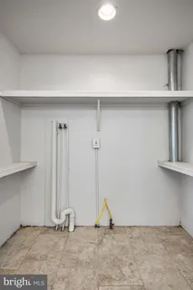 a view of a room with two chairs