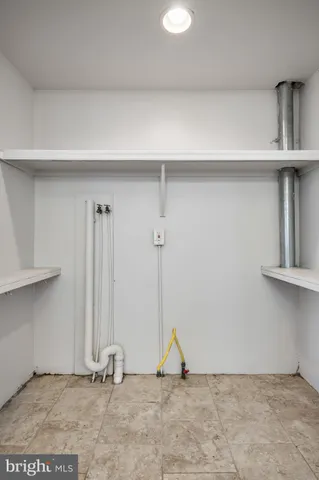 a view of a room with two chairs