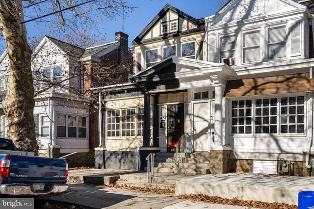 a front view of a building with street view