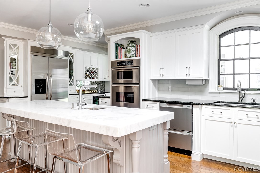 8915 Norwick Road Henrico, VA 23229 - Photo 15 of 47 New pendant lights. Stainless steel appliances.