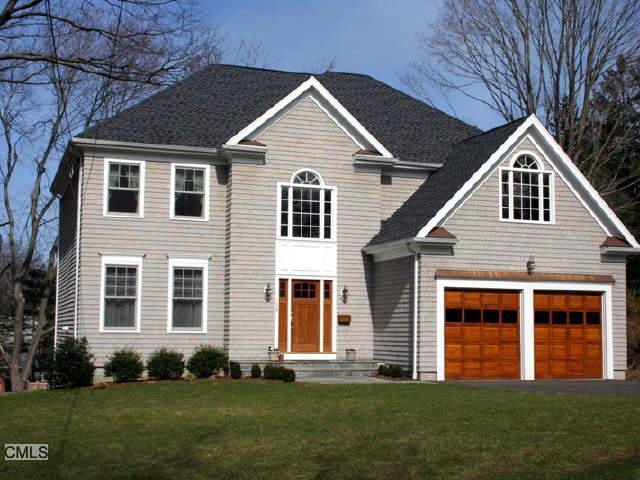 158 Ridgeview Avenue Fairfield, CT 06825 - Photo 1 of 1 a front view of a house with a yard