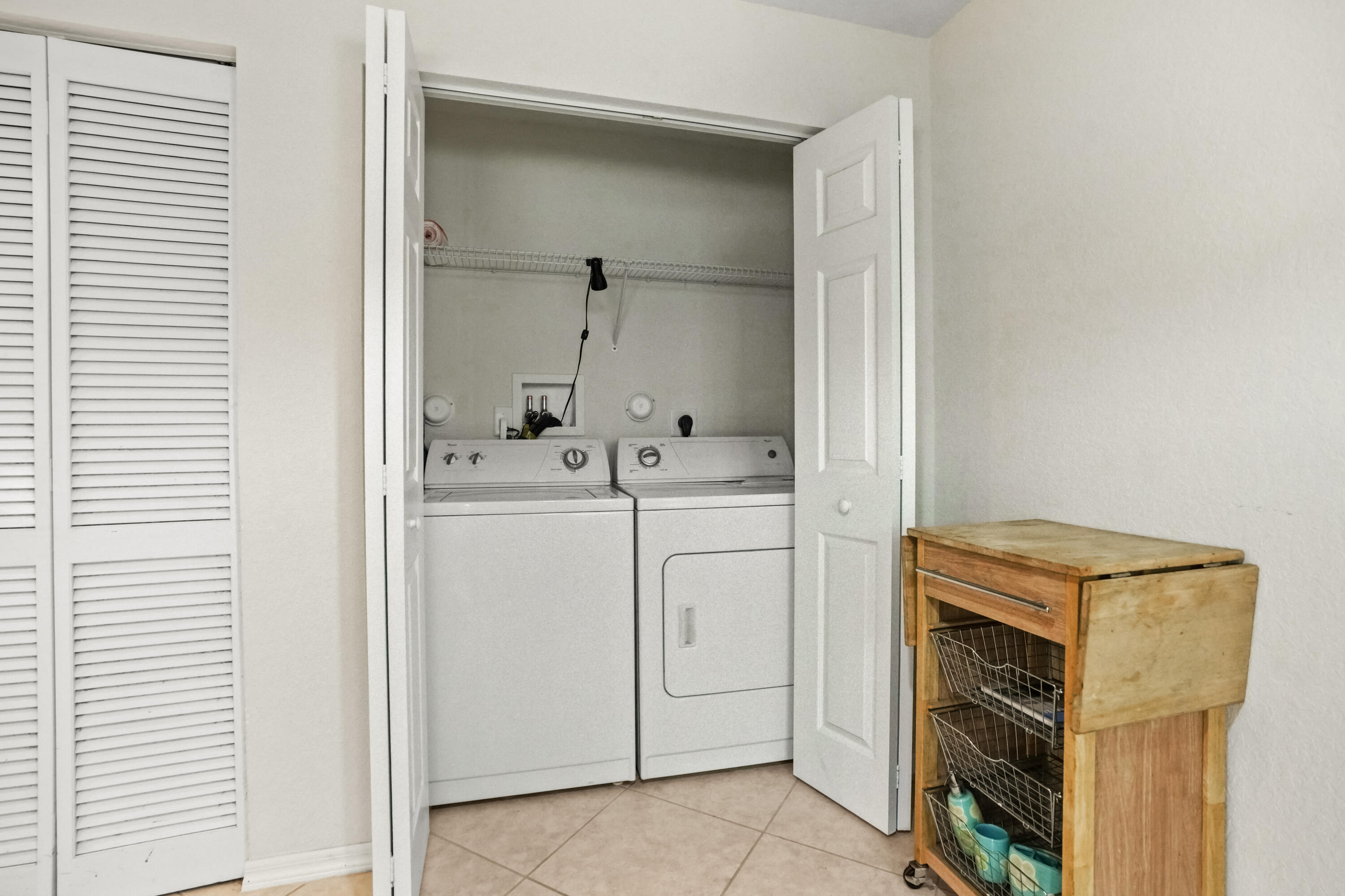 5961 London Lane Tamarac, FL 33321 - Photo 16 of 21 a utility room with dryer and washer