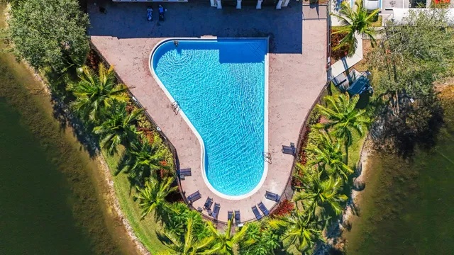 an aerial view of a swimming pool