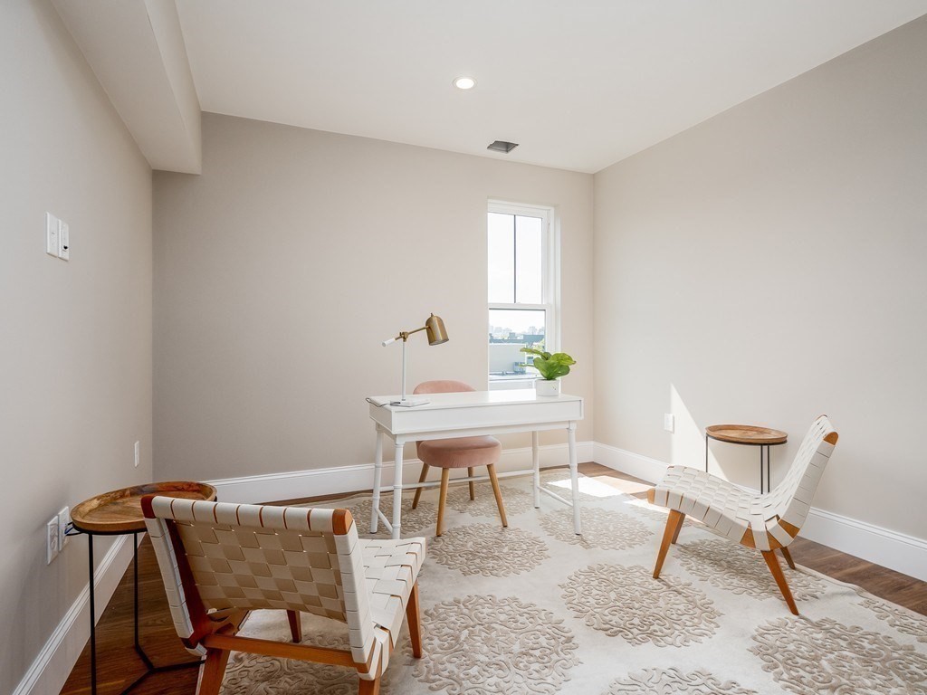 45 L Street, Unit 20 Boston, MA 02127 - Photo 19 of 28 a view of a workspace with furniture and window