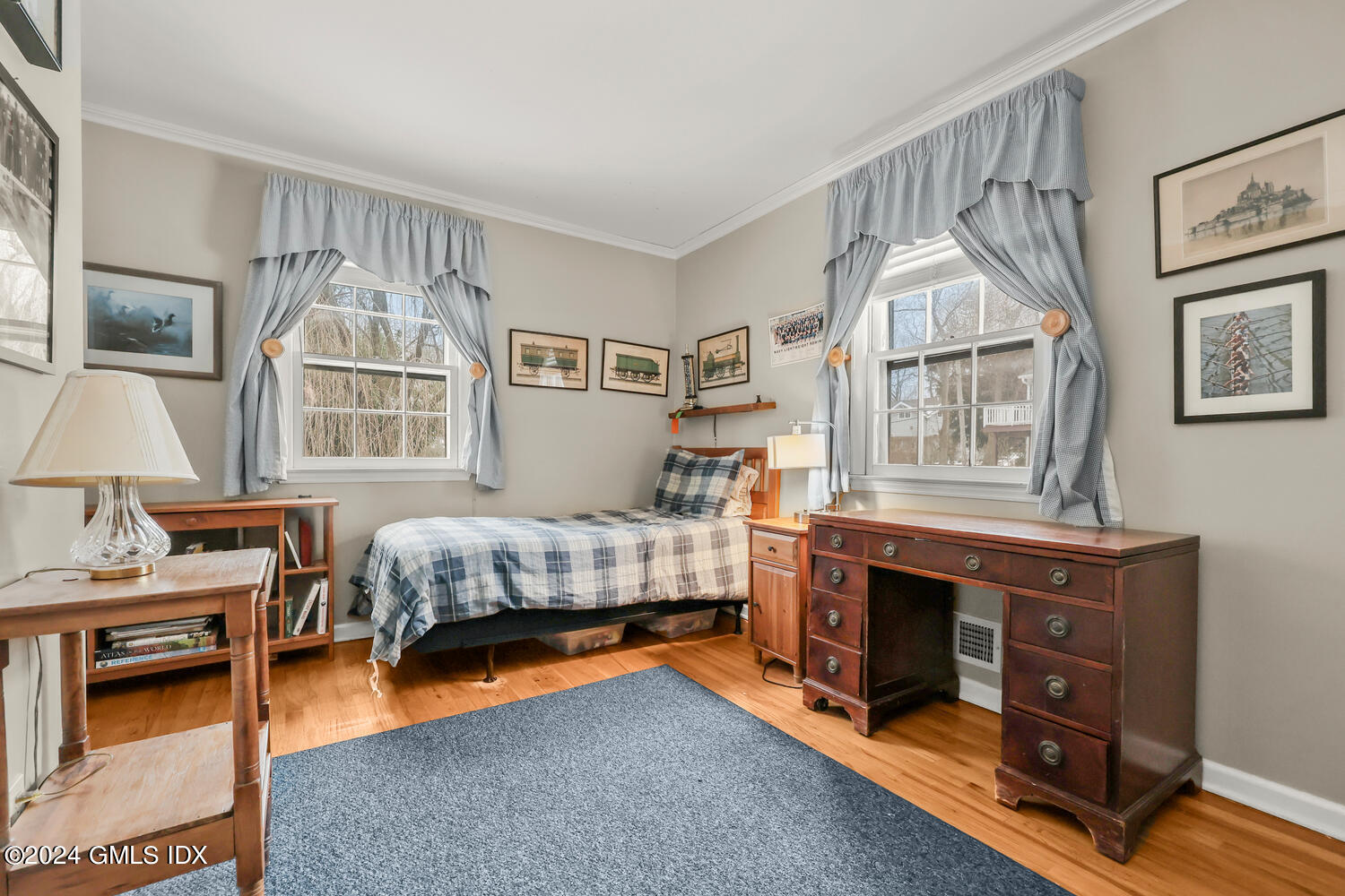 28 Juniper Lane Riverside, CT 06878 - Photo 14 of 22 a bedroom with a bed and a window