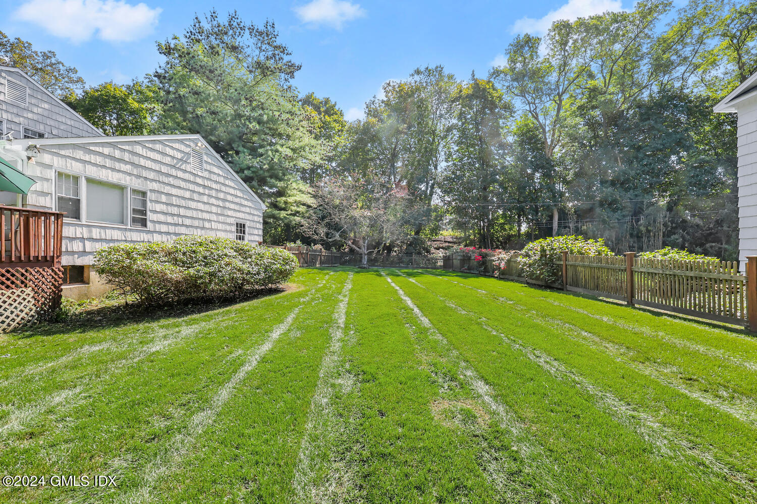 28 Juniper Lane Riverside, CT 06878 - Photo 17 of 22 a view of a backyard with a garden and plants