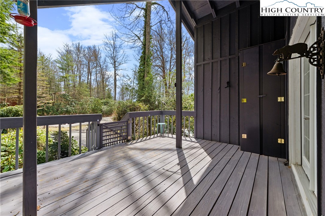 255 River Hollow Road Newland, NC 28657 - Photo 19 of 30 a view of a balcony with wooden floor