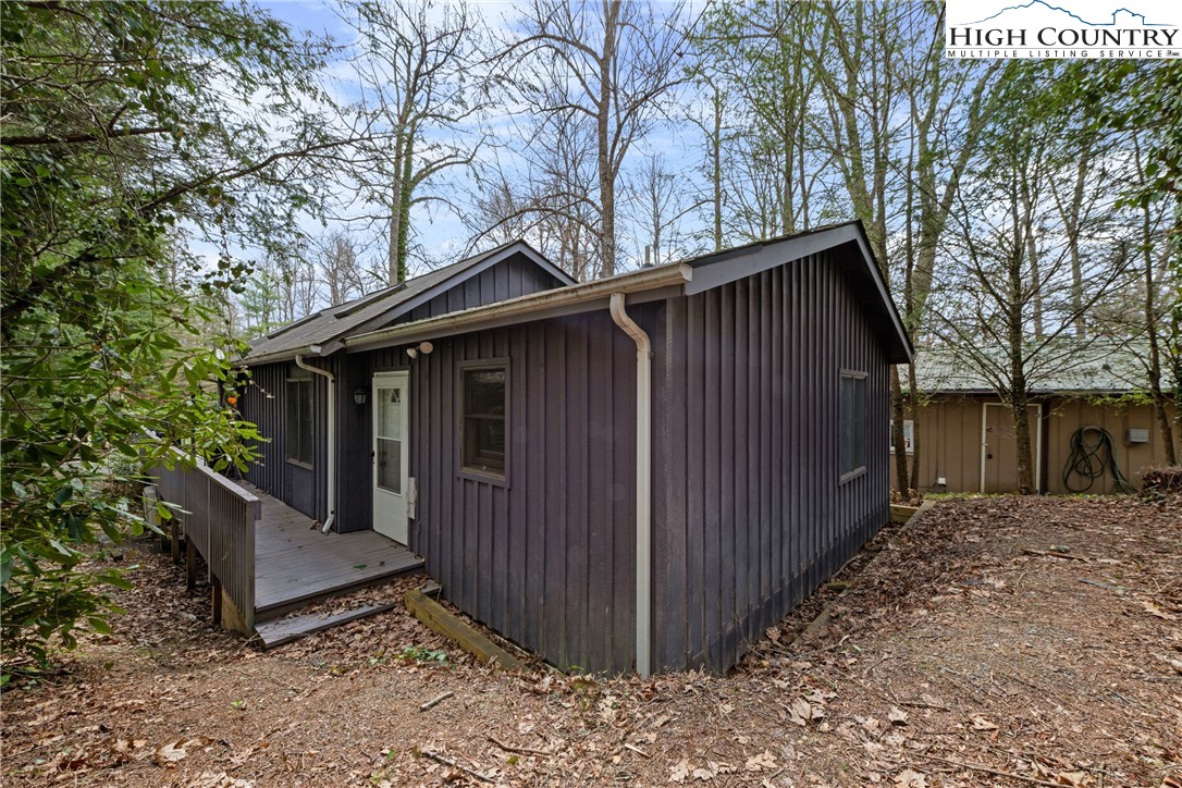 255 River Hollow Road Newland, NC 28657 - Photo 22 of 30 a front view of a house with a fence