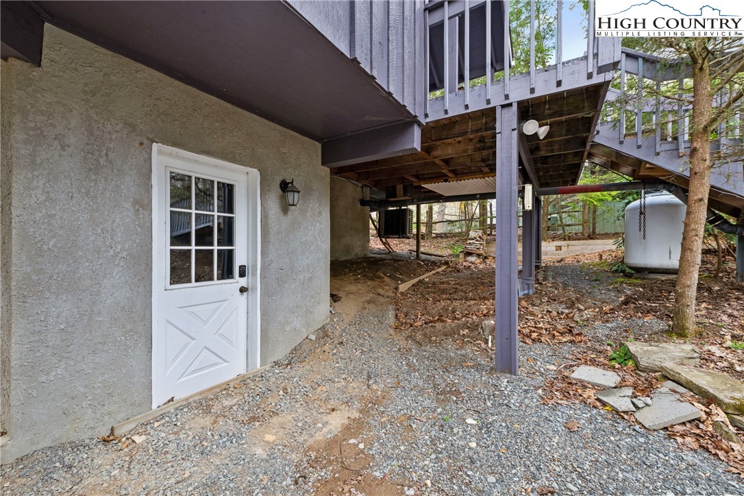 255 River Hollow Road Newland, NC 28657 - Photo 26 of 30 a view of a house with a porch