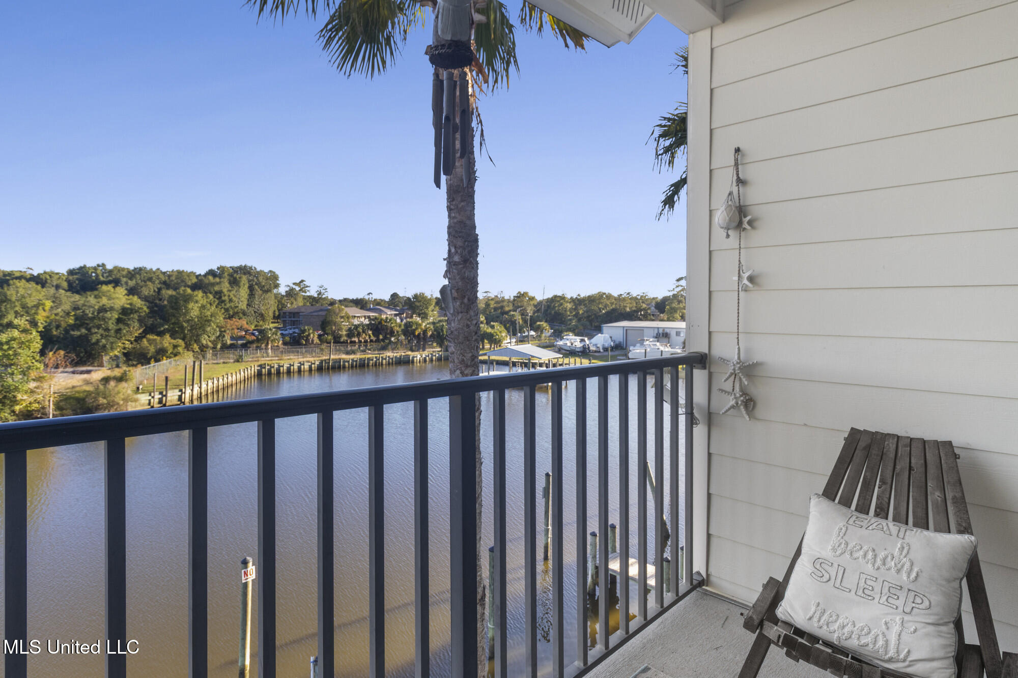 1400 Mill Road, Unit 31 Gulfport, MS 39507 - Photo 22 of 28 Primary Suite Balcony