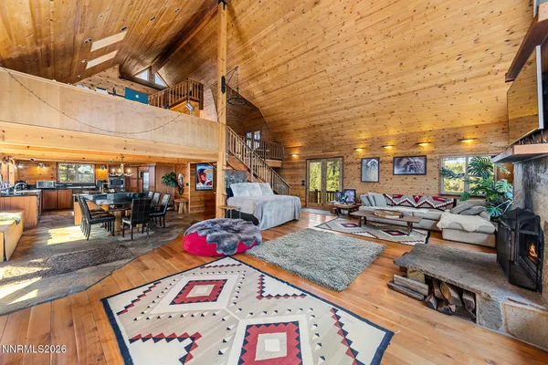 a view of a patio with a table and chairs