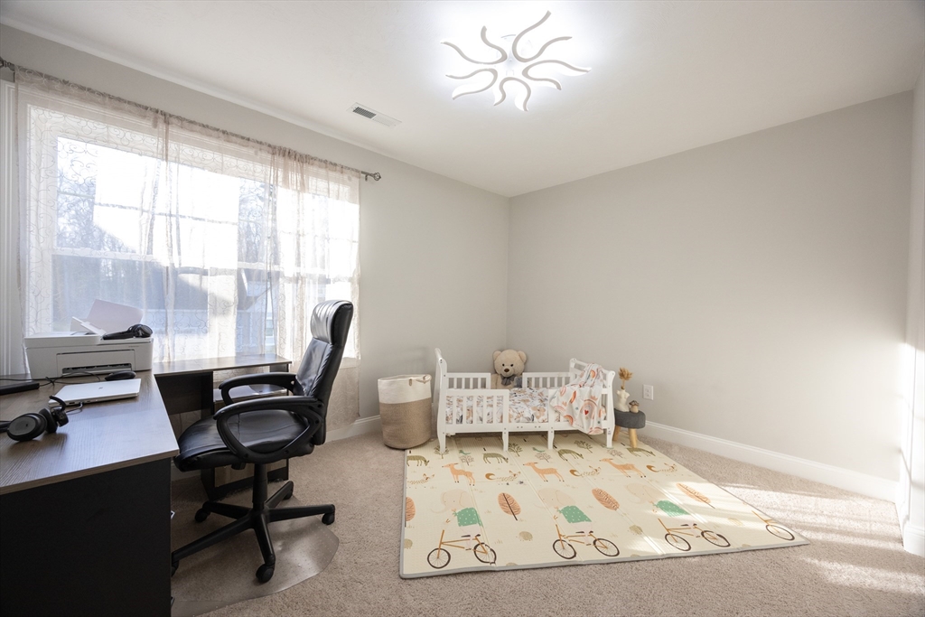 1 Clover Drive Bellingham, MA 02019 - Photo 26 of 34 a view of a workspace with furniture and a window