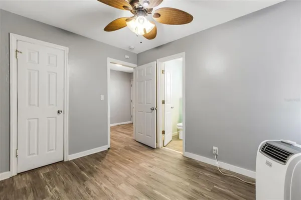 a bathroom with a shower and a toilet