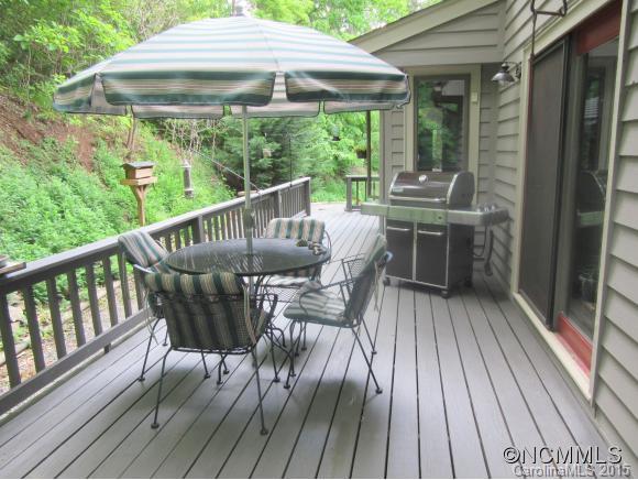 900 Mountain Cove Road Waynesville, NC 28786 - Photo 6 of 24 a view of balcony with furniture and wooden deck
