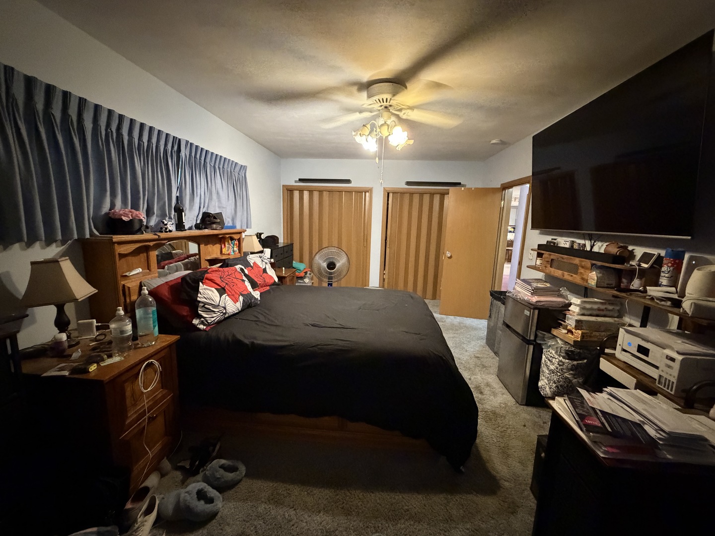 4019 5th Street East Moline, IL 61244 - Photo 12 of 37 a bedroom with a bed and a flat screen tv