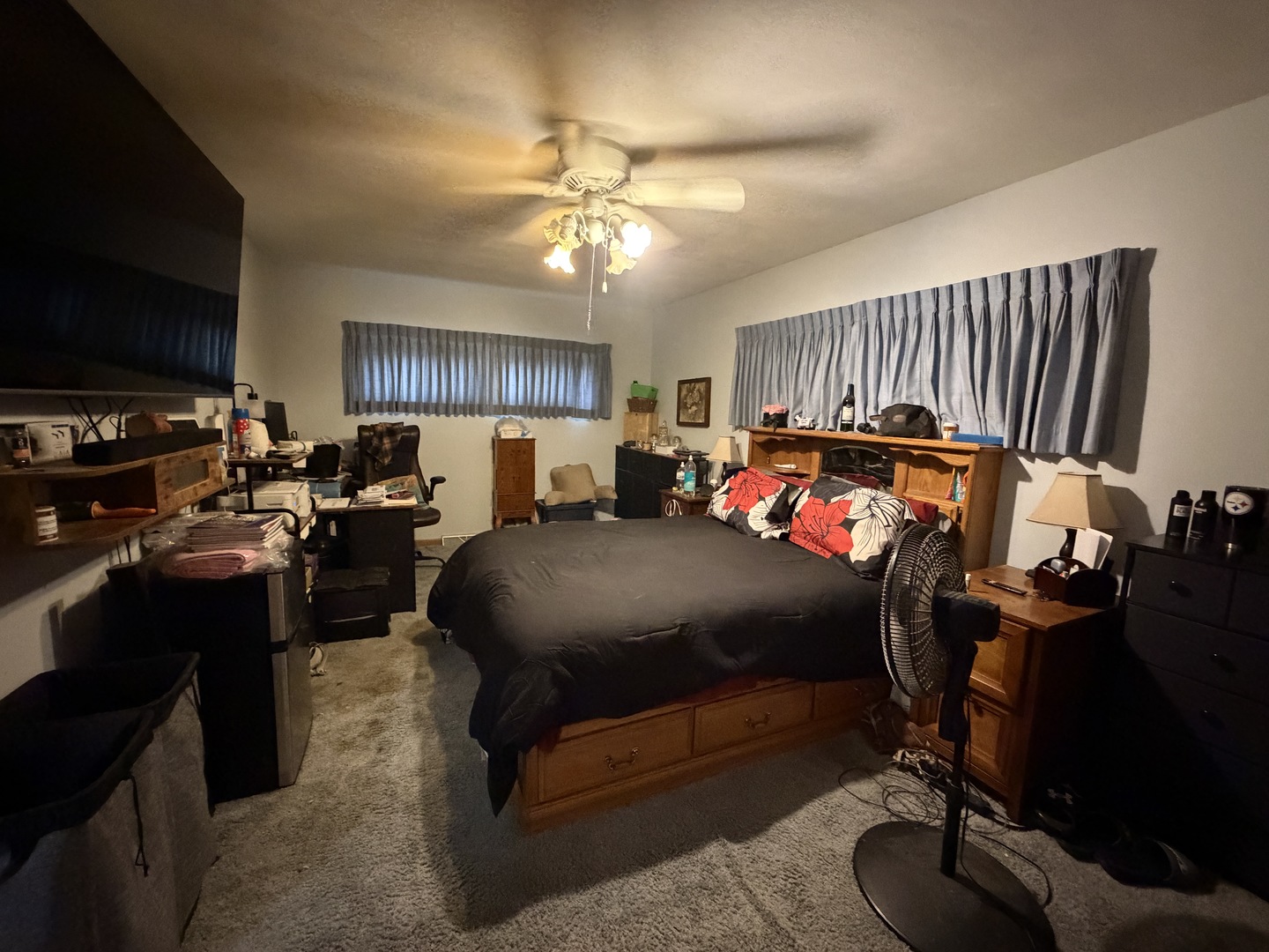 4019 5th Street East Moline, IL 61244 - Photo 14 of 37 a bed room with furniture and a flat screen tv