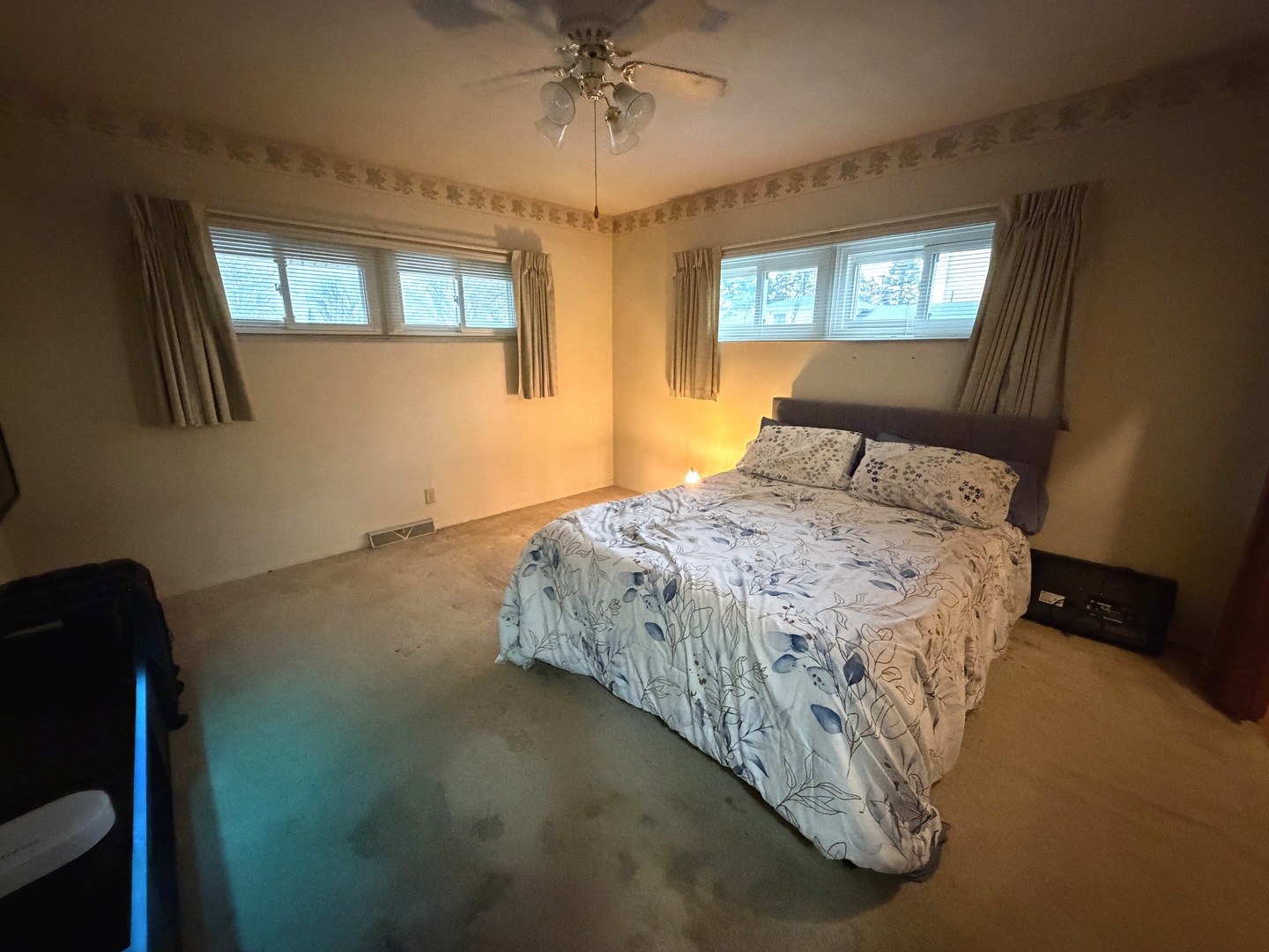 4019 5th Street East Moline, IL 61244 - Photo 15 of 37 a bedroom with a bed and window