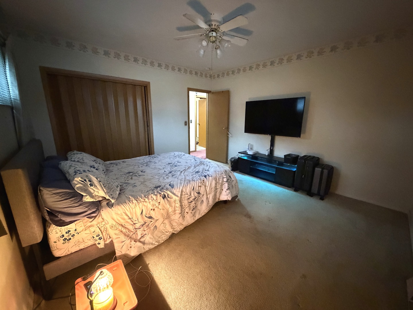 4019 5th Street East Moline, IL 61244 - Photo 17 of 37 a bedroom with a bed and a flat screen tv