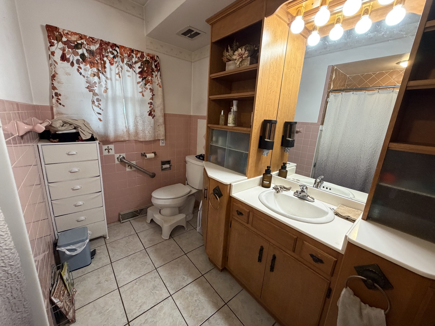 4019 5th Street East Moline, IL 61244 - Photo 19 of 37 a bathroom with a double vanity sink mirror and toilet